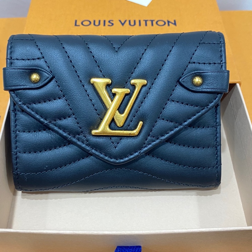 LOUIS VUITTON
Black Leather New Wave Compact Wallet - Picture 1 of 14